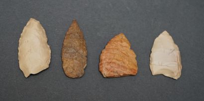 Four large blonde flint arrowheads. Neolithic....