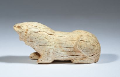 Lion couché en ivoire

Perse, Ier millénaire...