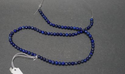Necklace made of lapis lazuli beads.

 L:...