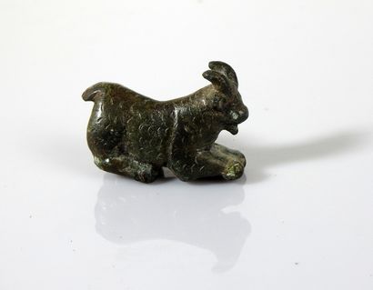 Statuette representing a goat. 

Bronze....