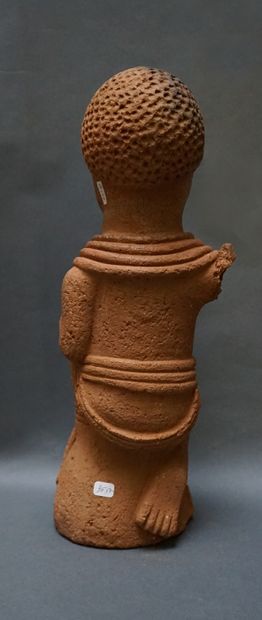 Anthropomorphic sculpture of a kneeling man...