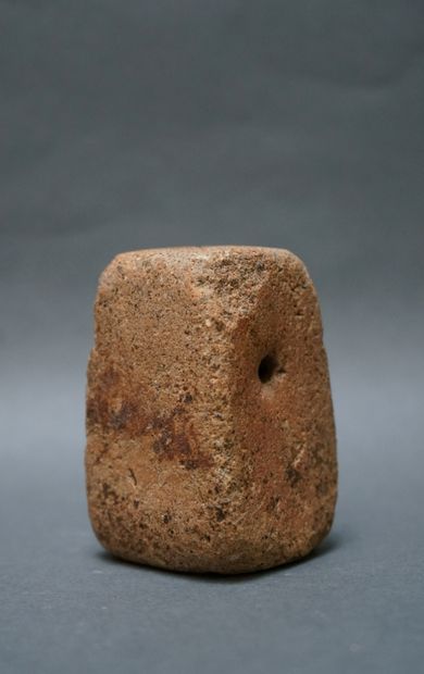 Weaver's weight in the shape of a truncated...