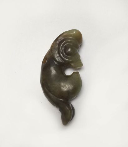 Small coiled dragon in green nephrite, veined...