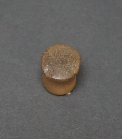Rock crystal labret in the shape of a pawn....