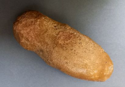 Neolithic polished stone axe with throat.

L:...