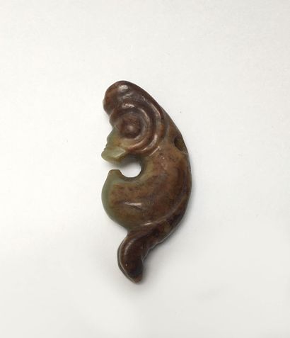 Small coiled dragon in green nephrite, veined...