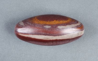 Lingam in beige and reddish stone

12x5c...