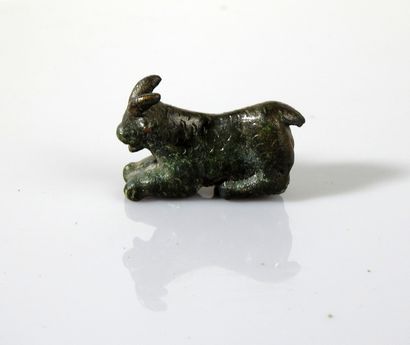 Statuette representing a goat. 

Bronze....