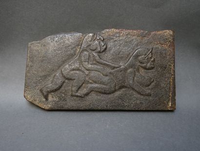 Grey stone plaque carved in relief with erotic...