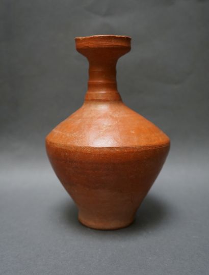 Jug with handle and flared neck in orange...