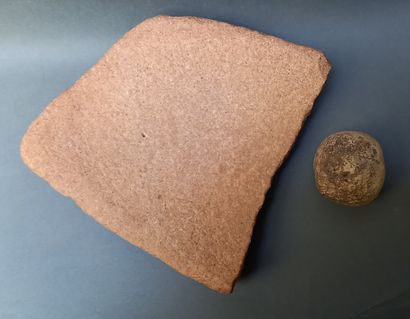 Fragmentary sandstone millstone and its pestle.

Neolithic...