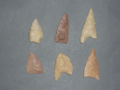 Set of six various Neolithic flint arrowheads....