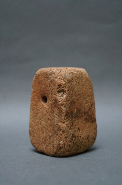 Weaver's weight in the shape of a truncated...