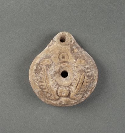 White terracotta oil lamp of the 