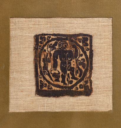 Bistre medallion representing a man carrying...