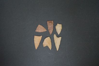 Set of six various Neolithic flint arrowheads....