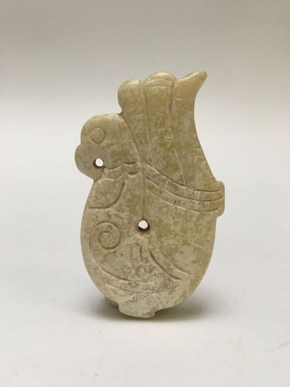 A fish-brain jade pendant representing a...