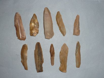 Set of ten flint knives and flap knives....