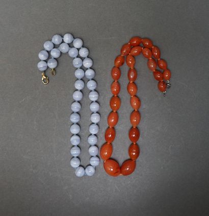 Set of two necklaces with round and oval...