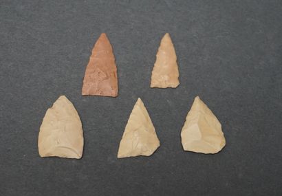Set of five Neolithic triangular flint arrowheads....