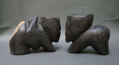 Pair of anthropomorphic black stone offering...