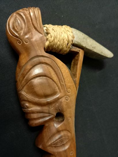 Handcrafted work for this Maori axe. Stone...
