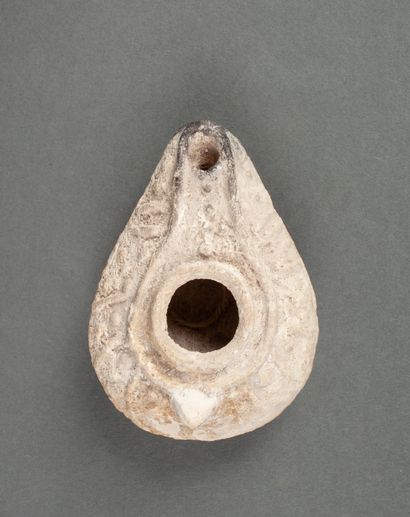 Oil lamp in beige terracotta decorated with...