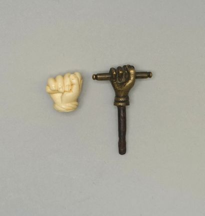 SET of two hands with clenched fist, one...