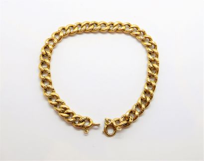 BRACELET in 18K (750/°°) yellow gold, curb...