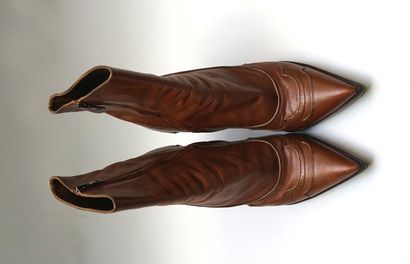 PRADA - Pair of boots with heels and skates...