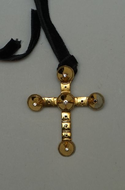 Gold metal and rhinestone cross pendant (1...