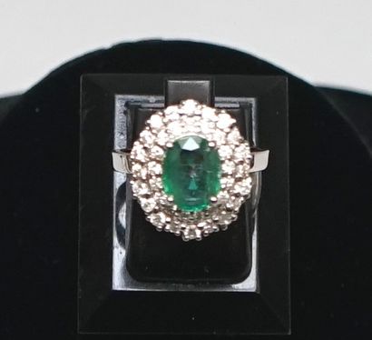 18k (750/°°) white gold ring centered on...