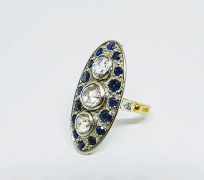ANCIENNE BAGUE en or jaune 18K (750/°°) et...