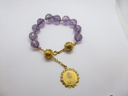 BRACELET in 18K (750/°°) yellow gold, faceted...