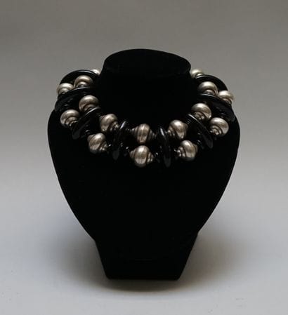 NECKLACE made of black pearls (onyx?) interspersed...