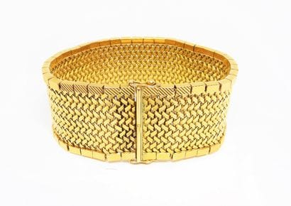 IMPOSING MANCHETTE BRACELET in 18K (750/°°)...