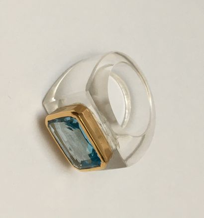 Ring in cut rock crystal, centered with a...