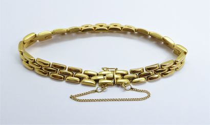 BRACELET in 18K (750/°°) yellow gold, articulated...