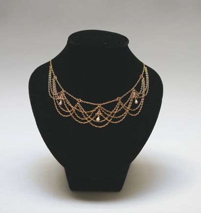 COLLIER draperie en or jaune 18k (750/°°)...