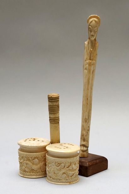 SET of a salt and pepper shaker, a needle...