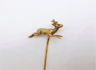 EPINGLE DE CRAVATE en or jaune 18K (750/°°),...