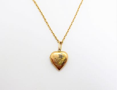 18K (750/°°) yellow gold chain with a heart-shaped...