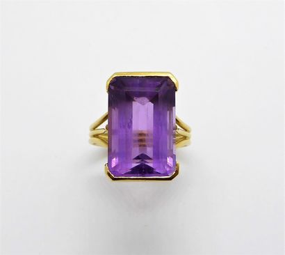 A 18K (750) yellow gold ring, set with an...