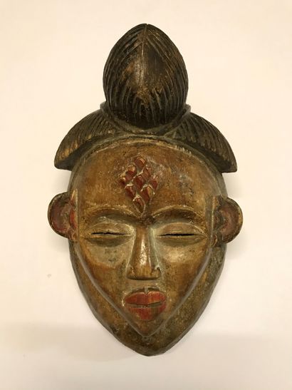 Masque anthropomorphe présentant un visage...