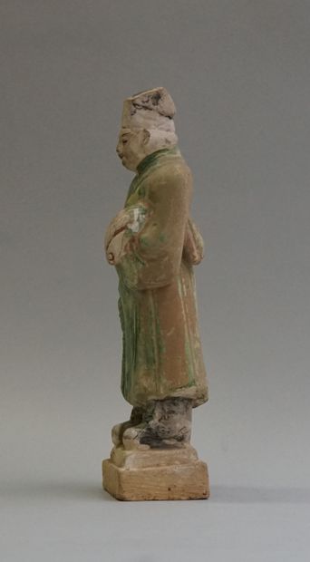 A polychrome and green-glazed earthenware...