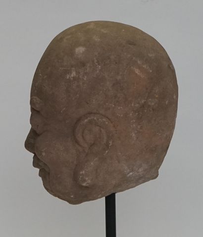 Arhat head in grey stone. 

Ming, 1368-1644...