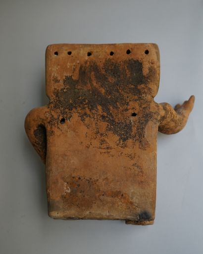Anthropomorphic statuette showing a seated...