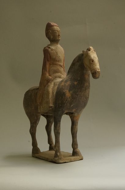 Beige terracotta rider with black, white...