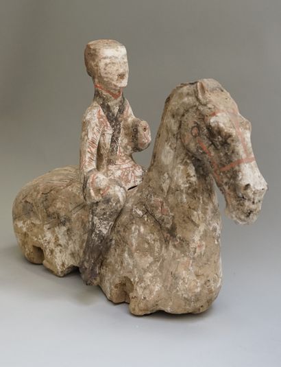 Legless horse with rider in polychrome terracotta....