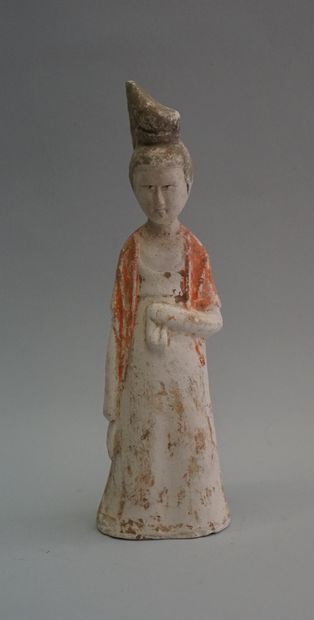 A beige terracotta court lady with white,...